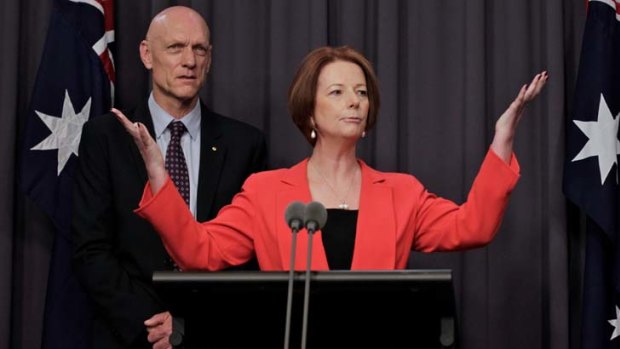 Not flighting back ... Julia Gillard, with education minister Peter Garrett.