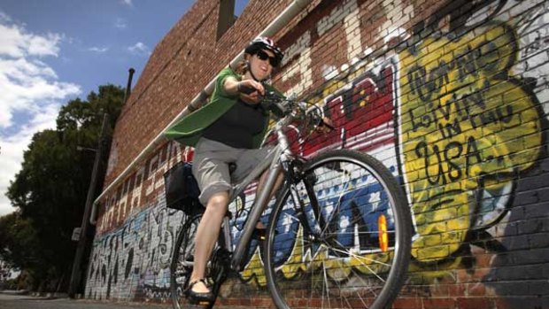 Slow cyclist Sue Tyrie enjoys some 'chill-out time" as she rides along the Upfield Bikeway at Brunswick.