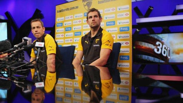 Hawthorn coach Alastair Clarkson and player Luke Hodge at a press conference today, ahead of their qualifying final against Collingwood on Friday.