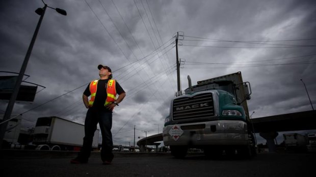 Toll worker Karael Vallecillo drives a truck in LA for $US13 an hour.