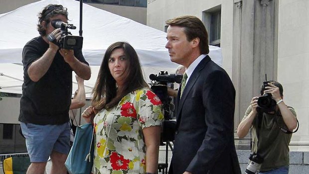 Cate Upham with  her father, former Senator John Edwards, outside court.