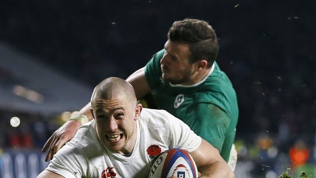 Mike Brown crosses the line for England's second try. 