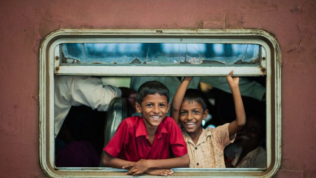 Children on a train in Sri Lanka.
