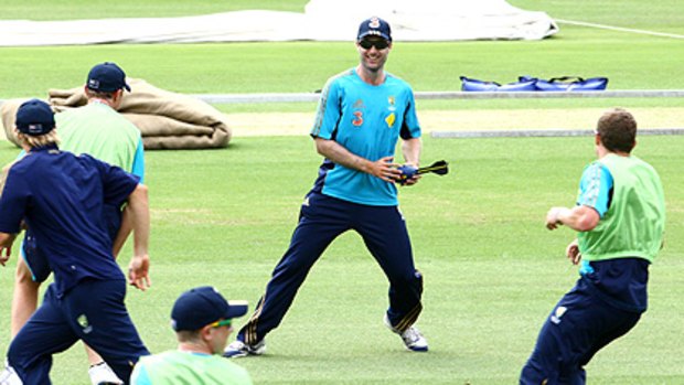 Simon Katich (centre) during training at the Sydney Cricket Ground yesterday.