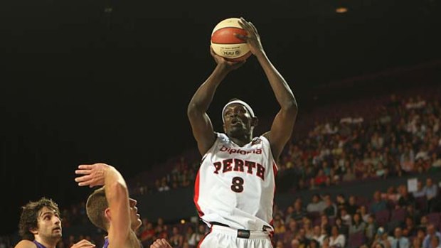 Future force ... Perth centre Ater Majok shoots during the 91-78 win over Sydney on Wednesday night.
