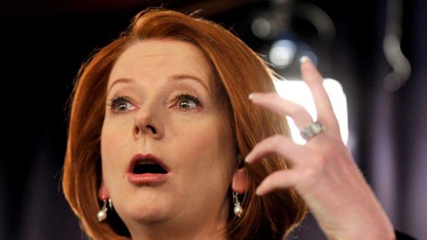 Julia Gillard speaks at the National Press Club in Canberra yesterday.