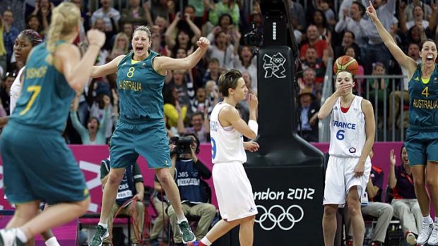 Australia's Suzy Batkovic (8) and Jenna O'Hea (4) celebrate after Belinda Snell's shot.