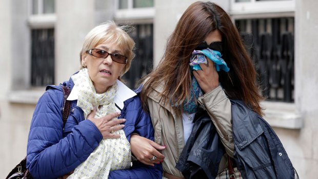 Anne (L) and Daniela Skinner (R), wife and daughter of mafia boss Domenico Rancadaore leave The City of Westminster Magistrates Court on August 9.