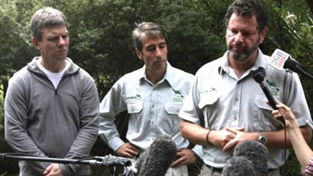 Bad news ... Taronga Zoo director Cameron Kerr, centre, elephant breeding expert Thomas Hilderbrandt, left, and senior veterinarian Larry Vogelnest, right, at a press conference on Monday to announce that the elephant calf had died.