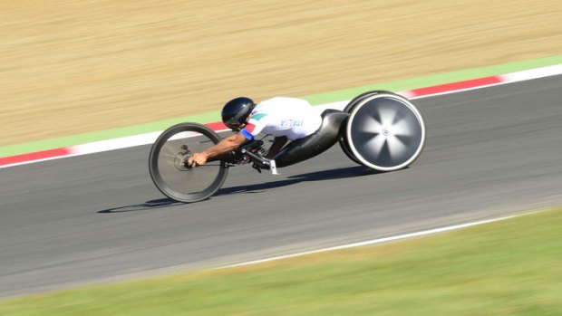 Italy's Alessandro Zanardi heads towards victory in the men's individual time trial cycling during the London 2012 Paralympic Games.