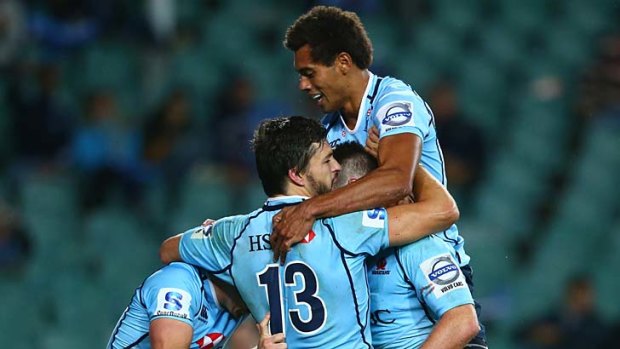 Out on top: Ben Volavola in celebration mode after Bernard Foley's try for the Waratahs on Friday night.
