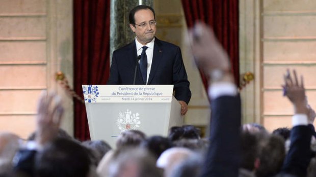 French President Francois Hollande gives a press conference to present his 2014 policy plans at the Elysee palace in Paris.