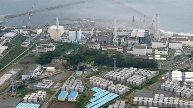 Aerial view: Tokyo Electric Power Company's tsunami-crippled Fukushima Daiichi nuclear power plant and its contaminated water storage tanks.