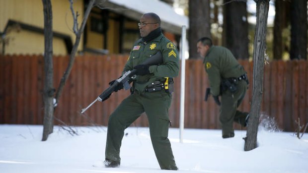 County Sheriffs search the home for former Los Angeles police officer Christopher Dorner.