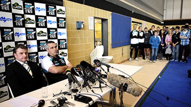 Port Adelaide coach Mark Williams (right) fronts the media yesterday to announce he is leaving the job. Sitting beside him is Port president Brett Duncanson.