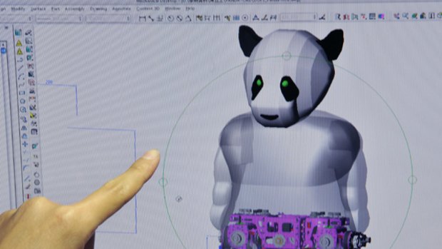 A technician points at a panda model on a monitor at the National Taiwan University of Science and Technology.