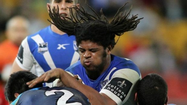 Hair of the Dog: Jamal Idris takes on the Titans while playing for the Bulldogs.