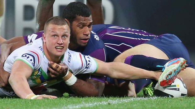 Touched down: Canberra's Jack Wighton scores in his side's victory to end Melbourne Storm's run of consecutive wins.