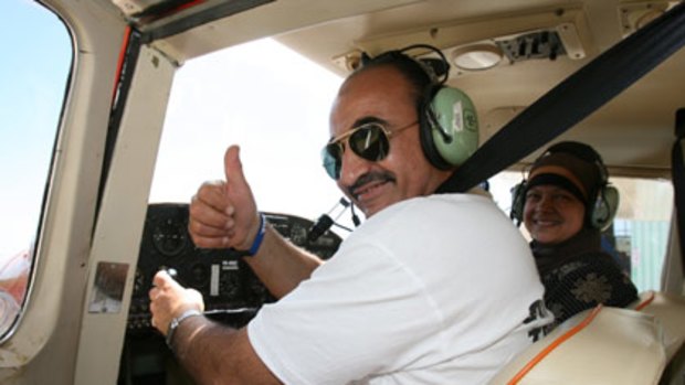 Exhilarating... Mamdouh Habib and wife Maha in the cockpit of a training aircraft at Bankstown Airport last week.