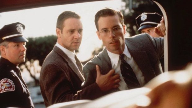 Mixed-up movie stars: Russell Crowe, second from left, and Guy Pearce playing Los Angeles police detectives in <i>L.A. Confidential</i>.