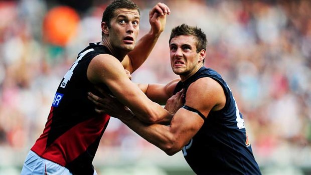 Essendon's Tom Bellchambers and Carlton's Shaun Hampson do battle earlier in the year.