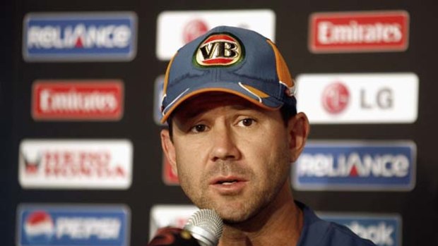 Mis-hit ... Ricky Ponting says he was not aiming at the changeroom TV when he threw his box.