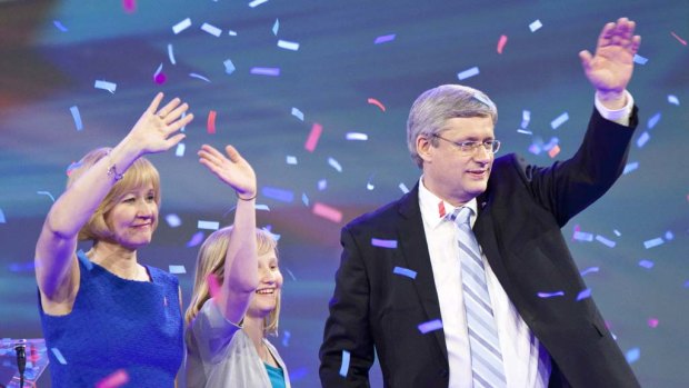 Conservative leader Stephen Harper, daughter Rachel and wife Laureen celebrate his victory.