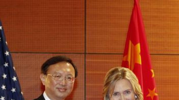 US Secretary of State Hilary Clinton shakes hands with China's Foreign Minister Yang Jiechi.