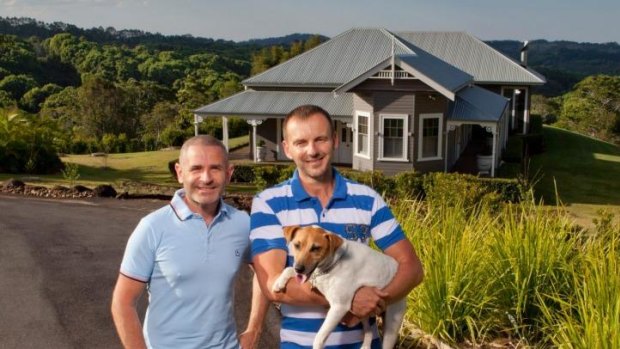 Gavin Atkins and Warren Sonin with their dog Charlie.