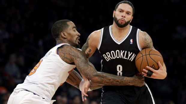 New York Knicks guard J.R. Smith fouls Brooklyn Nets playmaker Deron Williams. The Nets defeated the Knicks 103-80.