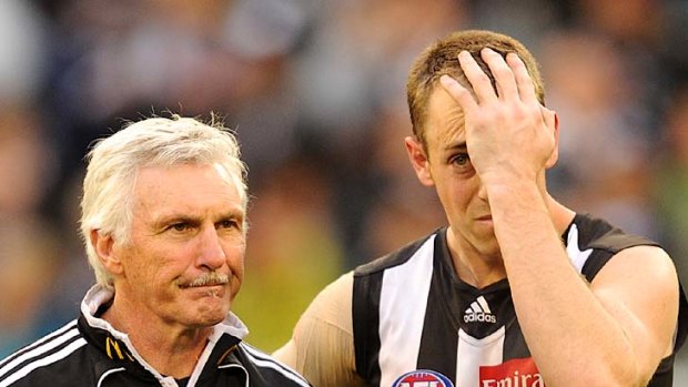 Mick Malthouse and Nick Maxwell after yesterday's grand final defeat.