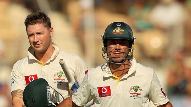 Michael Clarke and Ricky Ponting leave the field after play ended on day one of the fourth Test against India.
