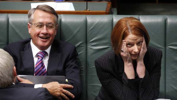 Seat of power . . . the Treasurer Wayne Swan and the Deputy Prime Minister, Julia Gillard. Both championed the government’s paid parental leave legislation, which the Opposition Leader, Tony Abbott, agreed was better than nothing.