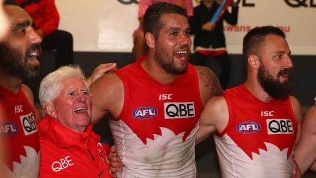 Kenny Williams leads the victory song with Swans players, from left, Adam Goodes, Lance Franklin and Nick Malceski after Franklin's 200th AFL match.