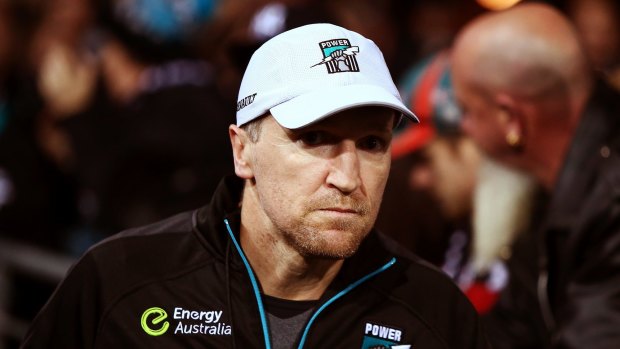 Darren Burgess of the Power looks on during the round 15 AFL match between the Port Adelaide Power and the Richmond Tigers at Adelaide Oval in 2016.