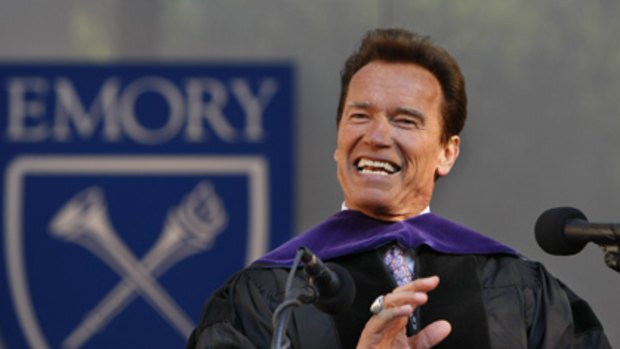 Cuts to come... Arnold Schwarzenegger receives an honorary degree at Emory University in Atlanta this week.
