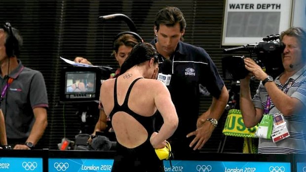Emily Seebohm breaks down in tears as she speaks with Channel Nine's Grant Hackett following her silver medal in the 100m backstroke.