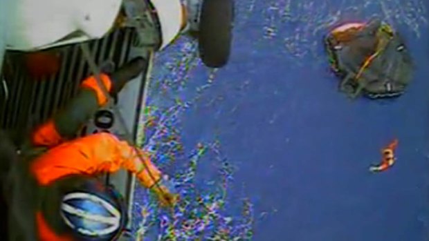 Rescue bid ... the US Coast Guard tries to rescue a crew member.