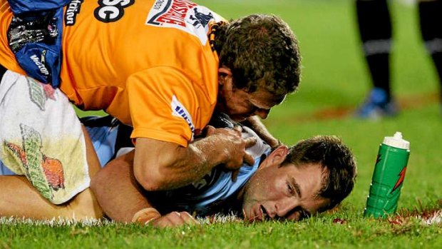 In Disneyland: Ben Ross is concussed playing for Cronulla against Manly in 2008.