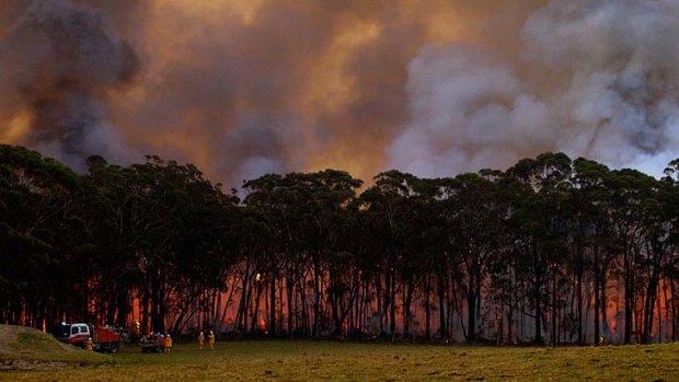 Counter-tactics: RFS Crews in Bilpin begin a backburning operation as they fight the Lithgow State Mine fire.