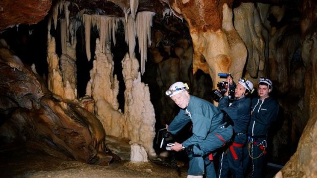Werner Herzog and his crew inside the spectacular La Grotte Chauvet.