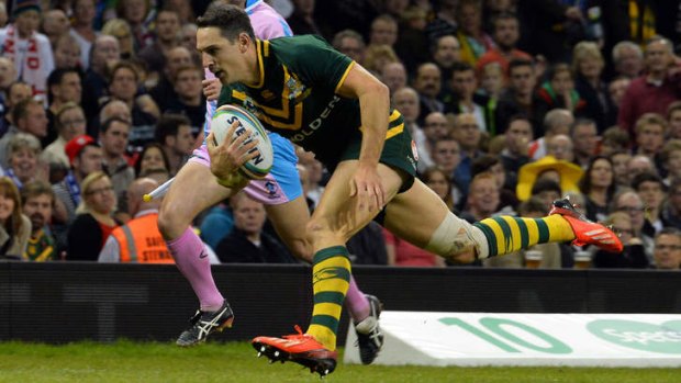Australia's Billy Slater scores a try during the 2013 Rugby League World Cup group A match between Australia and England at the Millennium Stadium in Cardiff.