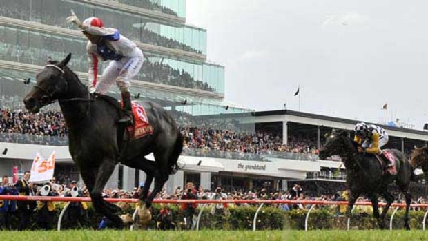 Gerald Mosse wins the Melbourne Cup on Americain.