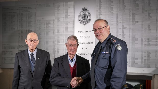 Former chief commissioner Mick Miller, former policeman Denis Ryan and Chief Commissioner Graham Ashton.