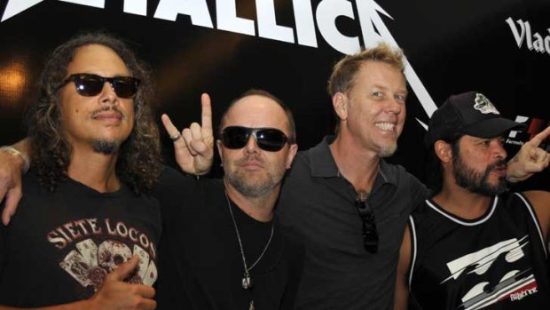 Metallica pose for photos in India earlier in the week.