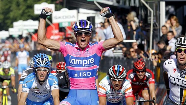 Flying ... McEwen's rival, Italian Alessandro Petacchi, celebrates after winning stage two of the Giro d'Italia in Parma.