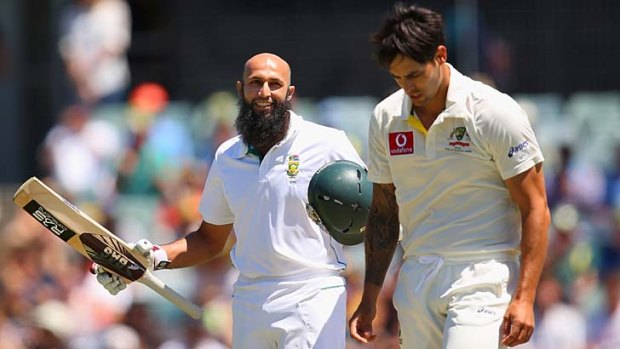 Hashim Amla is all smiles after scoring his century as Proteas piled on the runs on day three.