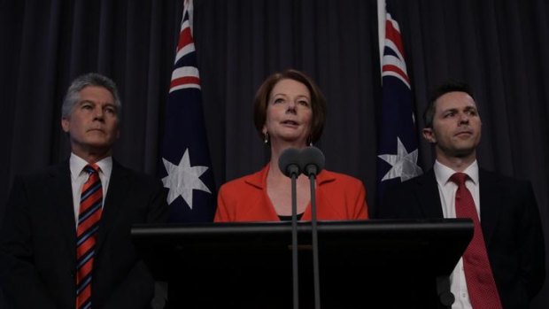 Prime Minister Julia Gillard speaks to the media during a joint press conference with Defence Minister Stephen Smith and Defence Materiel Minister Jason Clare at Parliament House.