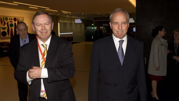 Paul Keating, right, arrives at the ACTU conference's black tie dinner.