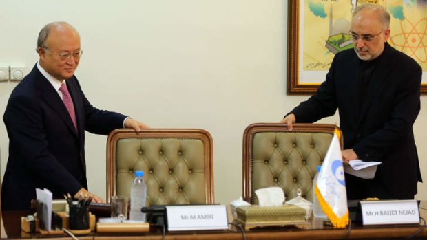 Pact: Iran's nuclear agency chief Ali Akbar Salehi (right) and International Atomic Energy Agency director-general Yukiya Amano at their meeting in Tehran.